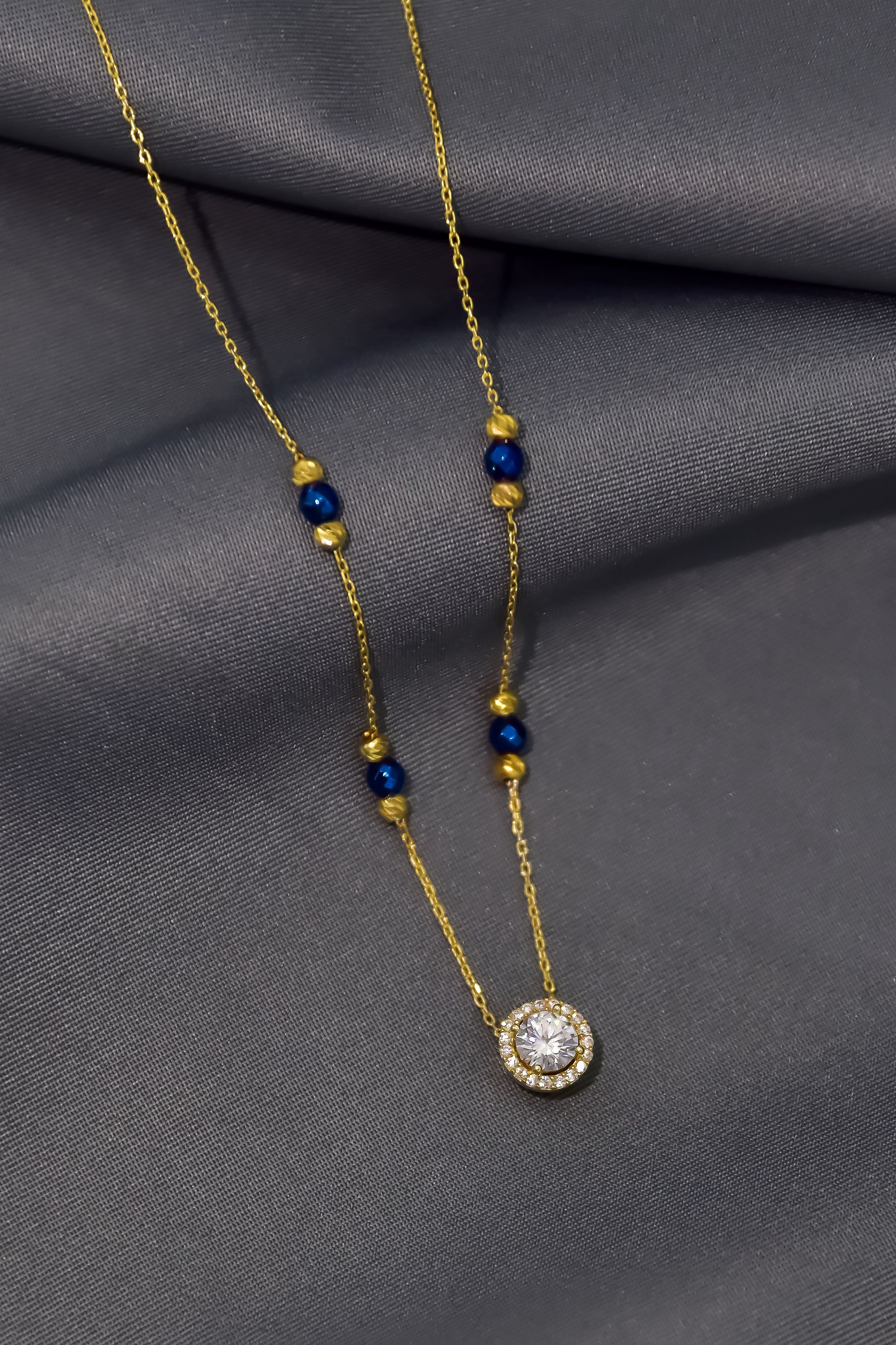 925 Ayar Gümüş Gold Kaplama Lacivert Boncuklu Dorika Toplu Kayan Tek Taş Kolye