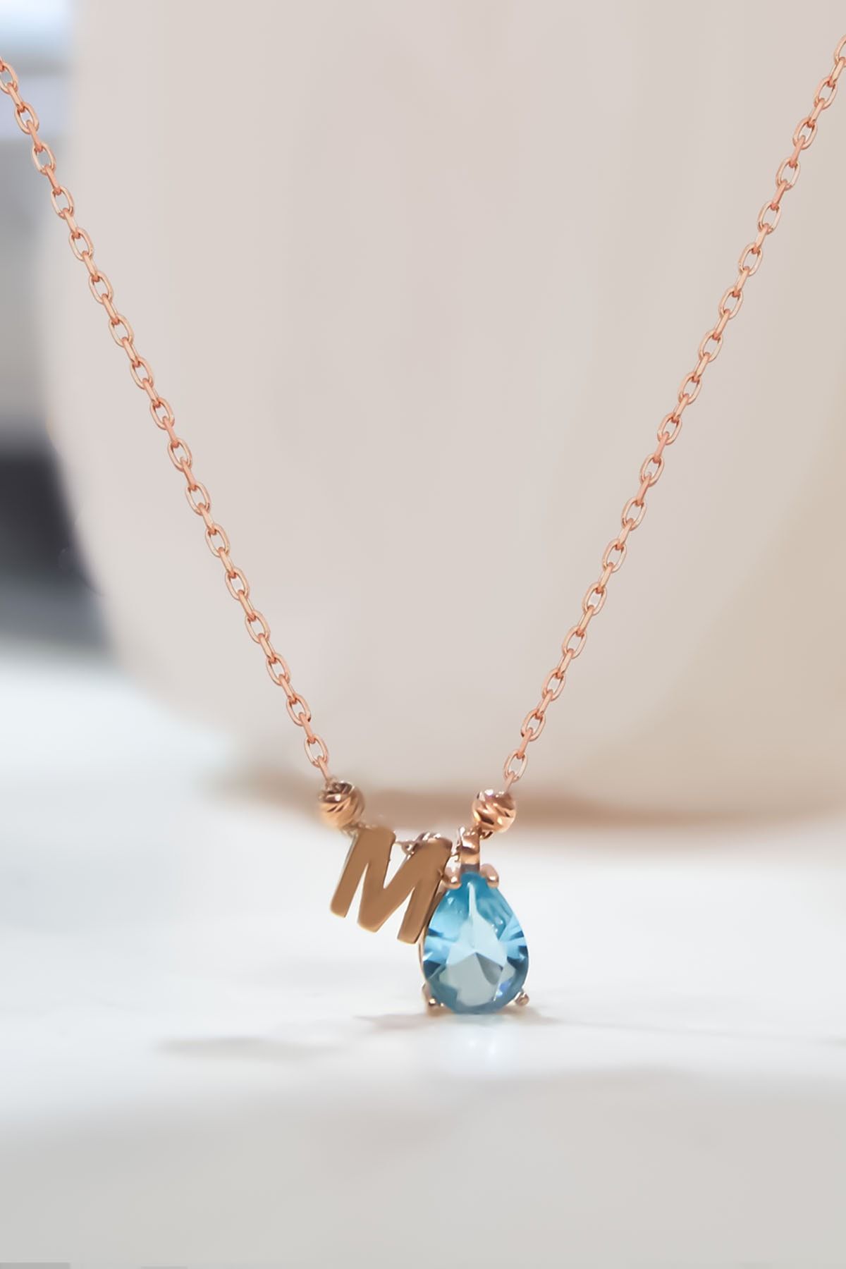 925 Ayar Gümüş Rose Kaplama Mart Ayı Damla Doğum Taşlı Dorika Toplu , Harfli Kolye