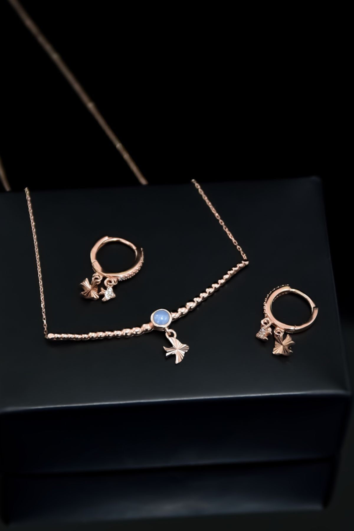 925 Ayar Gümüş Rose Kaplama Top Motifli Lila Ay Taşı Kırlangıç Kolye Ve Küpe Set