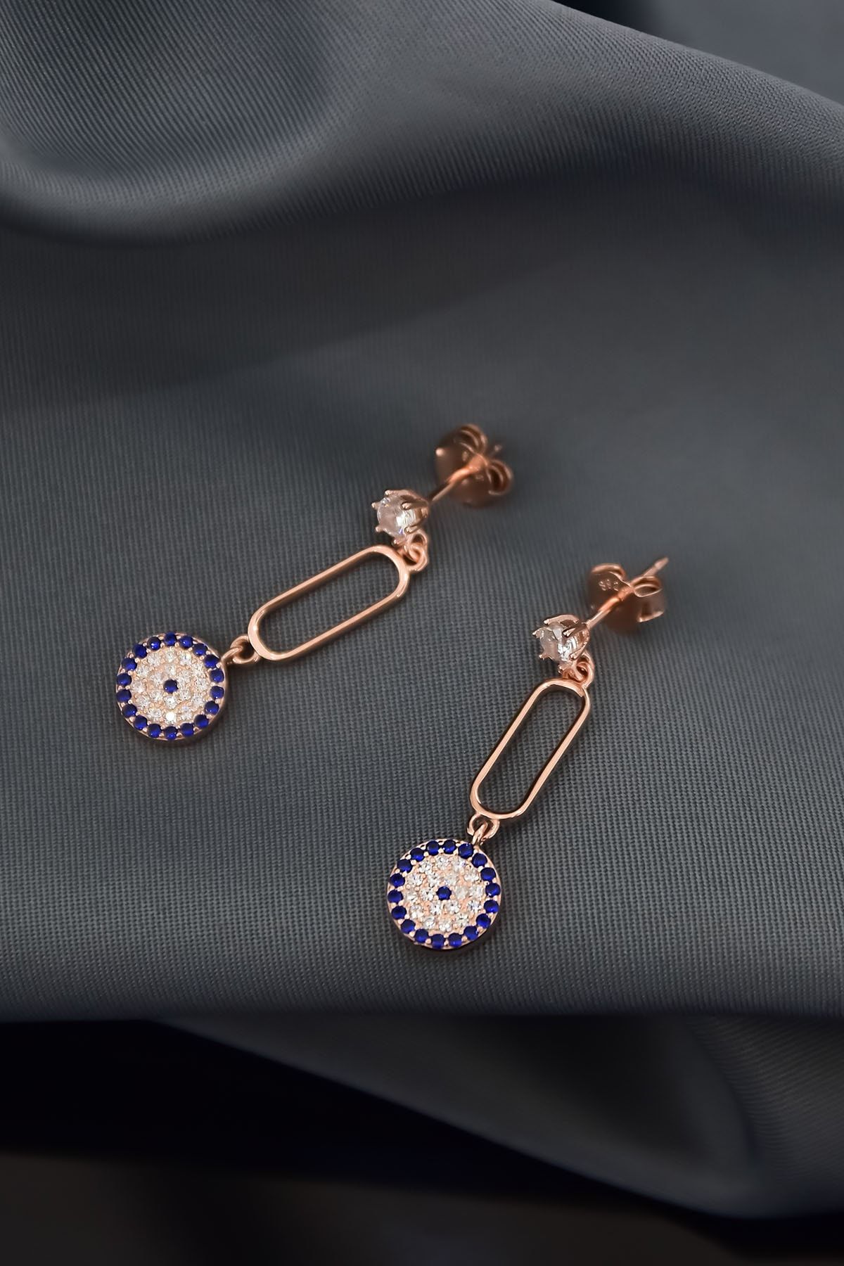 925 Ayar Gümüş Rose Kaplama Zirkon Taşlı Tek Taş Sallantılı Kutup Nazar Küpe